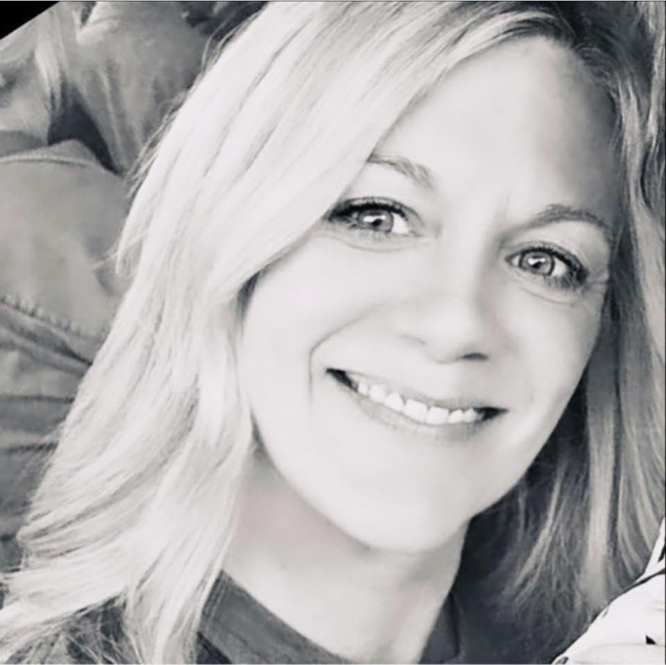 Black and white headshot of Rachel